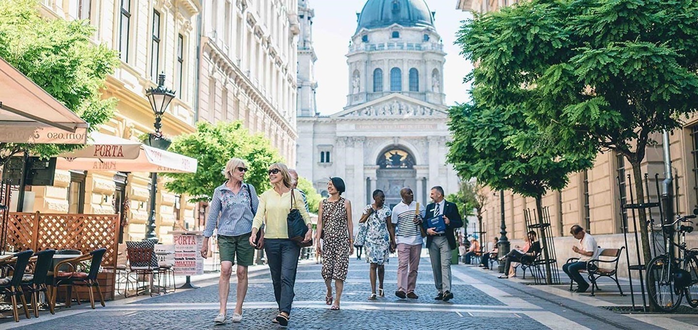 People walking down a European street